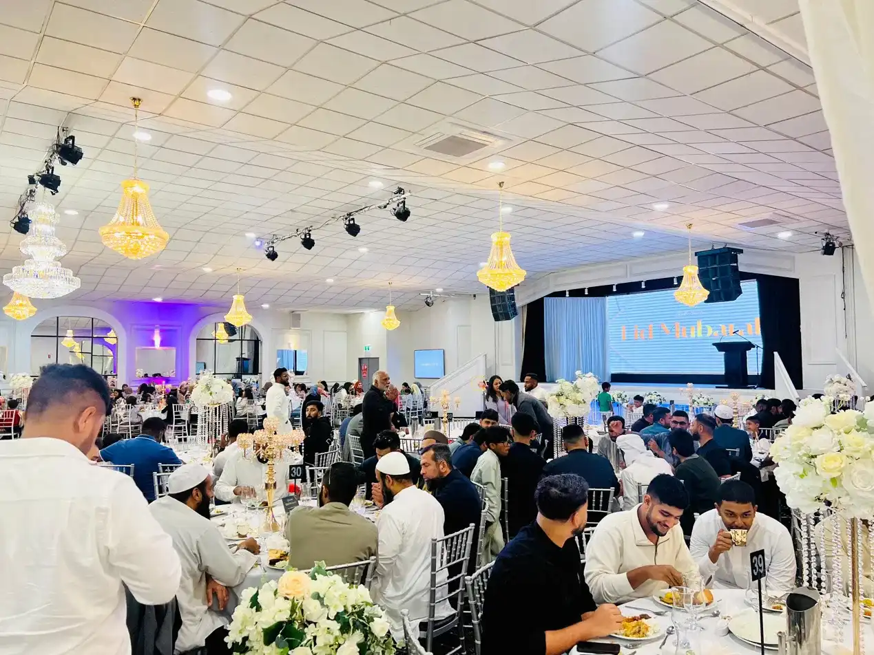 ICASA community members sharing a meal at an Eid gathering in Melbourne
